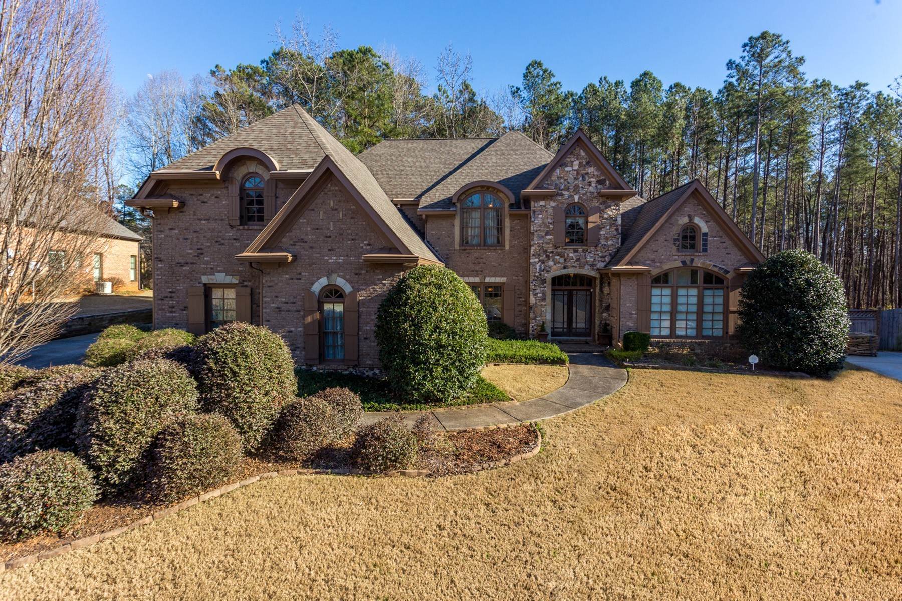 Single Family Homes for Sale at Stunning Brick and Stone Located in Hawthorne at Lost Mountain 1115 Meadow Grass Lane Powder Springs, Georgia 30127 United States