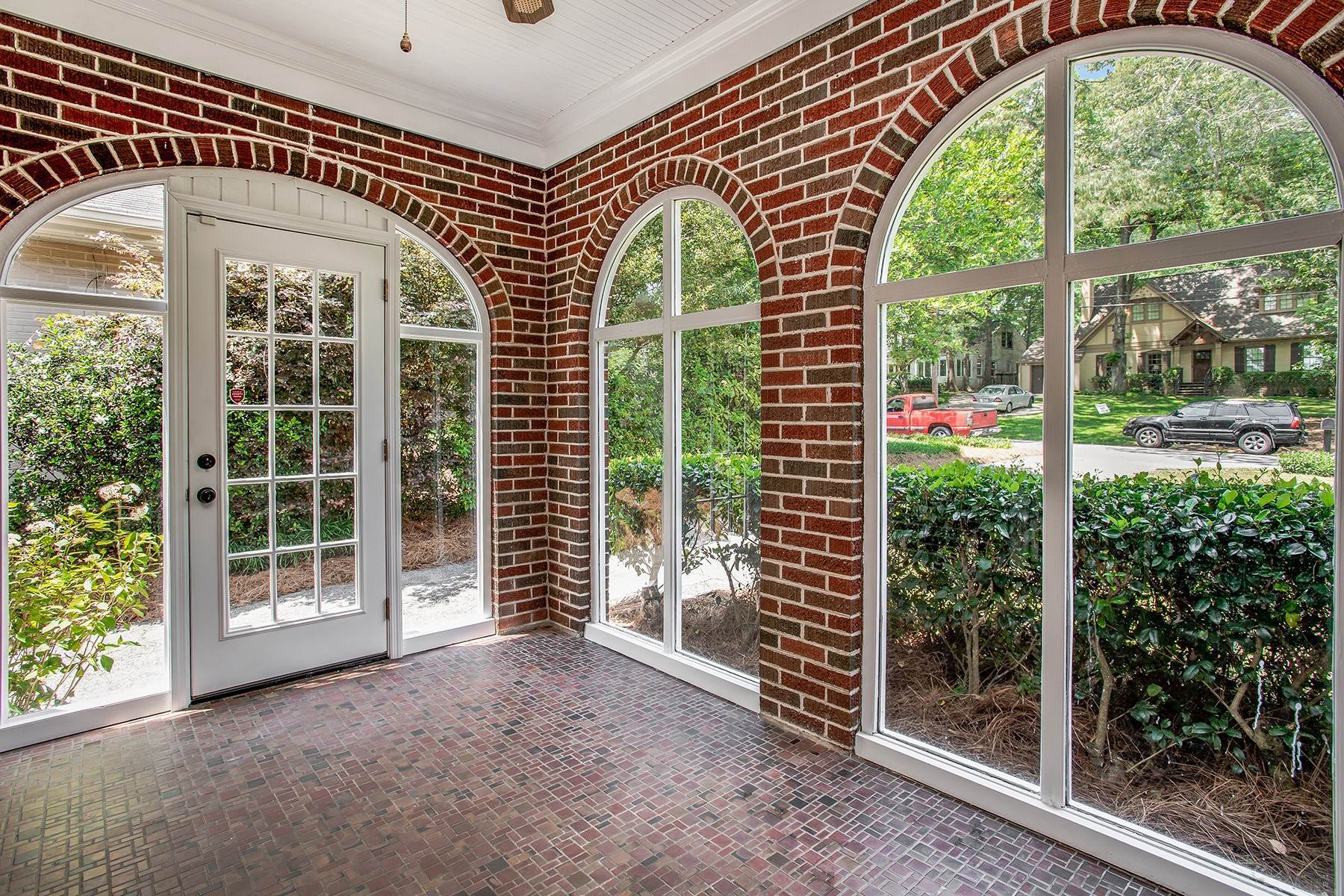 6. Single Family Homes for Sale at The Possibilities Are Endless In This Charming Four-Sided Brick Home 3551 Kingsboro Road Atlanta, Georgia 30319 United States