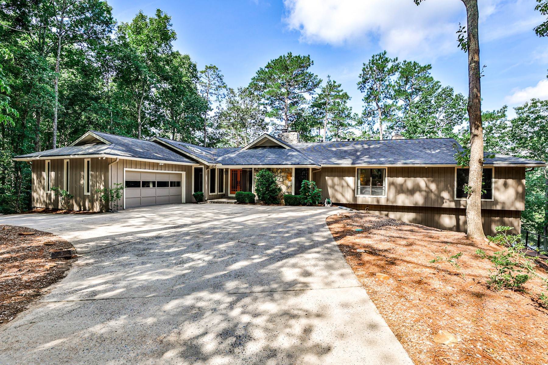 Single Family Homes for Sale at Elegant and Tranquil Contemporary Ranch in Huntcliff 9615 Huntcliff Trace Sandy Springs, Georgia 30350 United States