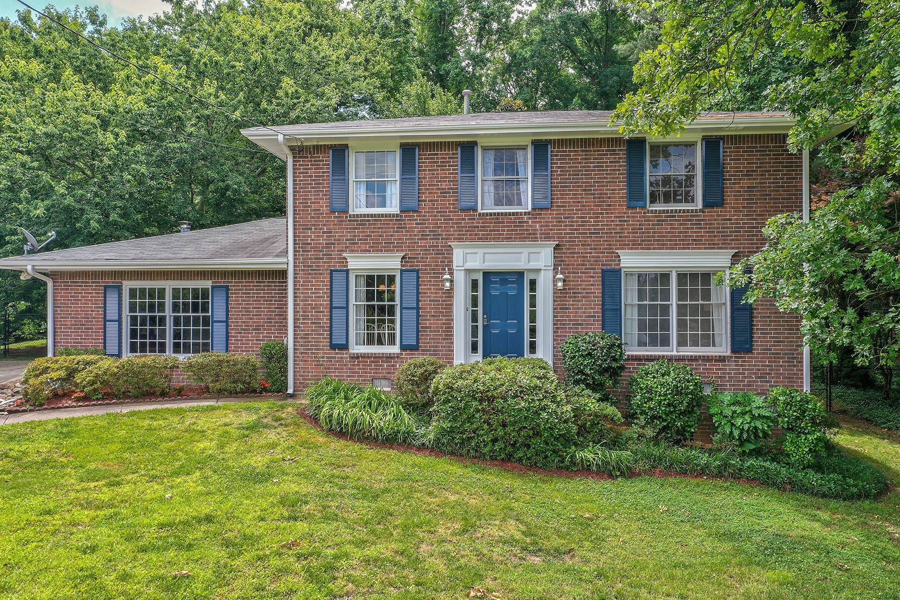 Single Family Homes for Sale at Traditional Brick Home in Peachtree Corners/Dunwoody 3701 Geraldine Court Peachtree Corners, Georgia 30360 United States