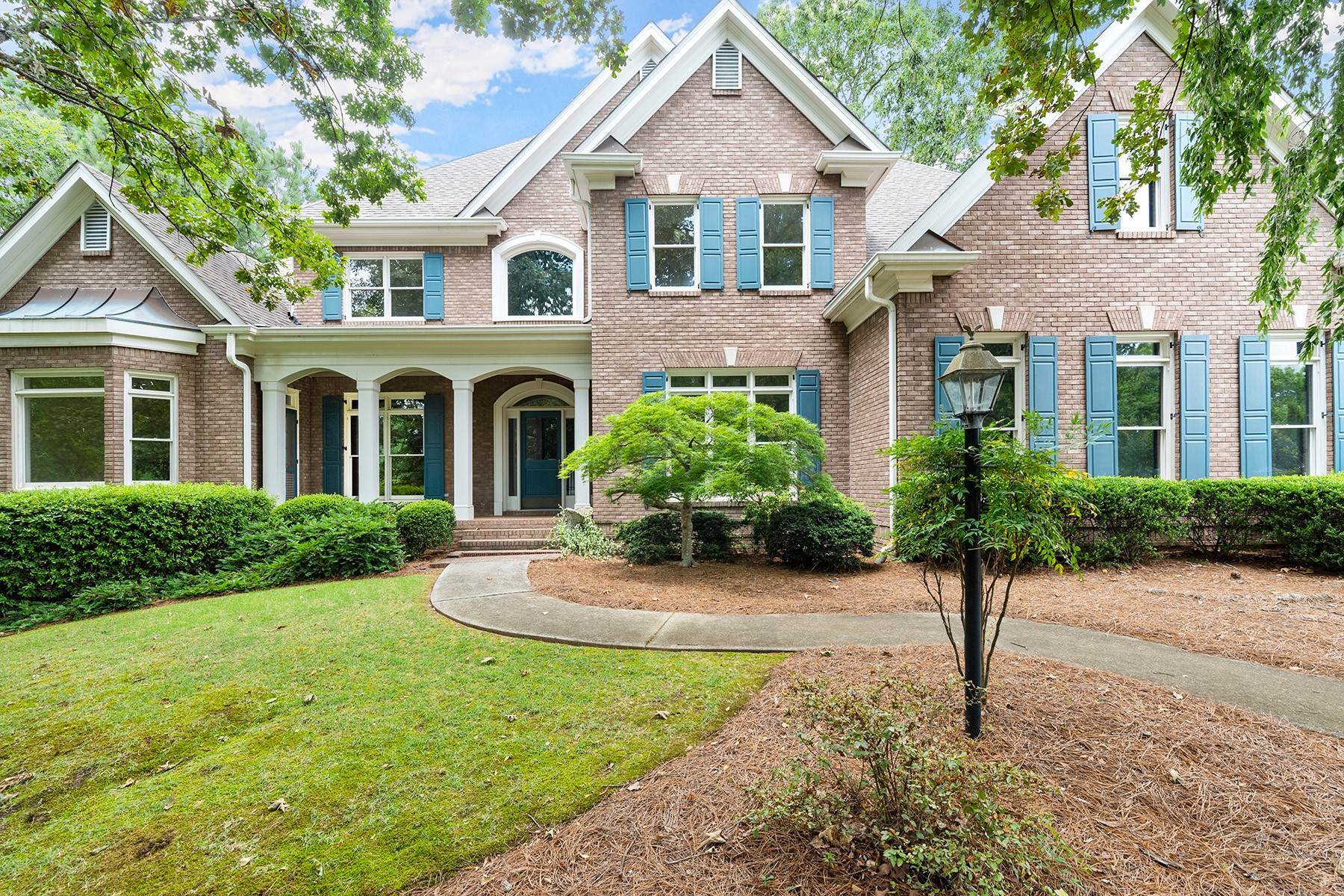 1. Single Family Homes for Sale at Custom-Built Home with Main Floor Owner's Suite in Gated Windward 1430 Portmarnock Drive Alpharetta, Georgia 30005 United States