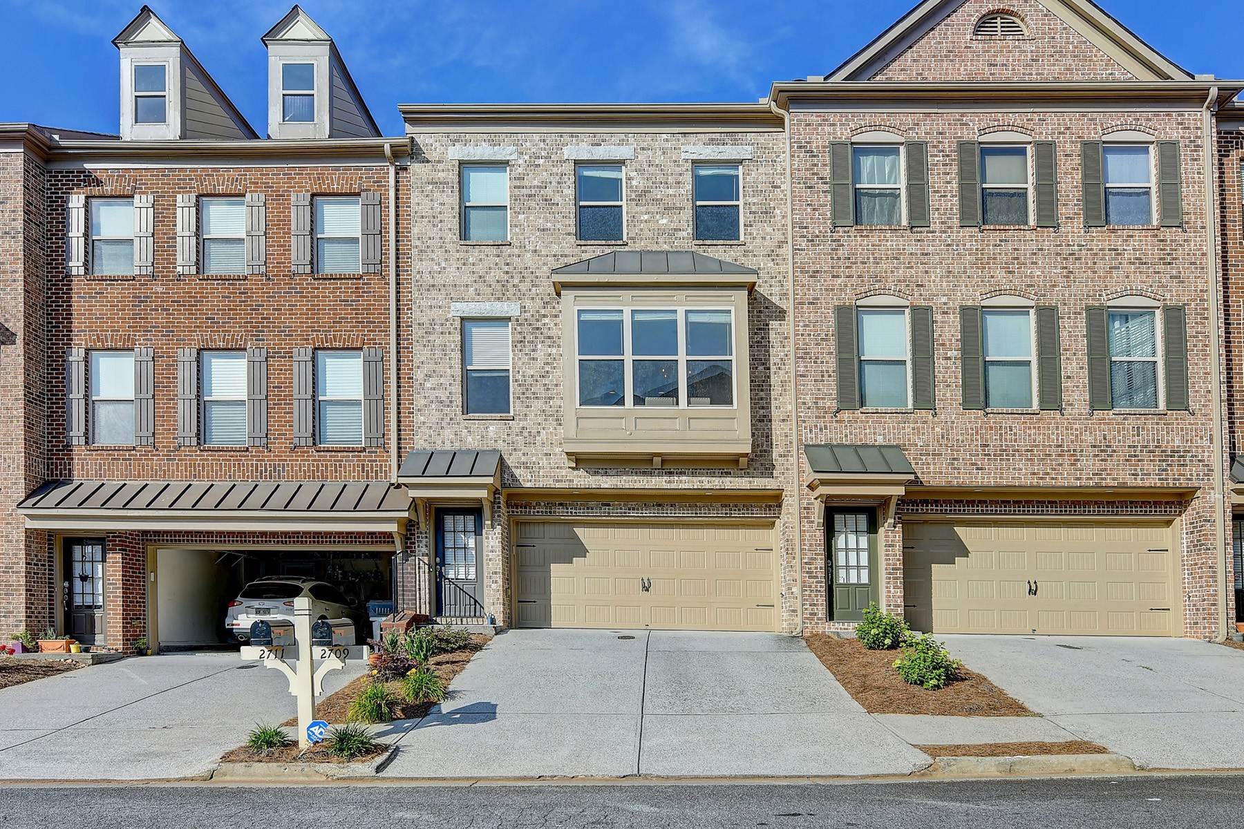 Townhouse for Sale at Move-In Ready Townhome in Gated Suwanee Community 2709 Hallwood Lane Suwanee, Georgia 30024 United States