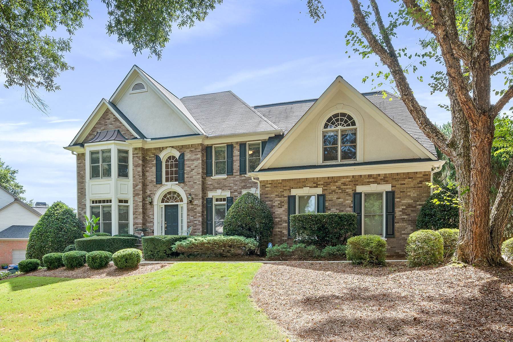 1. Single Family Homes for Sale at Impeccably Maintained Traditional in Highly Sought-After Grand Cascades 523 Settles Road Suwanee, Georgia 30024 United States