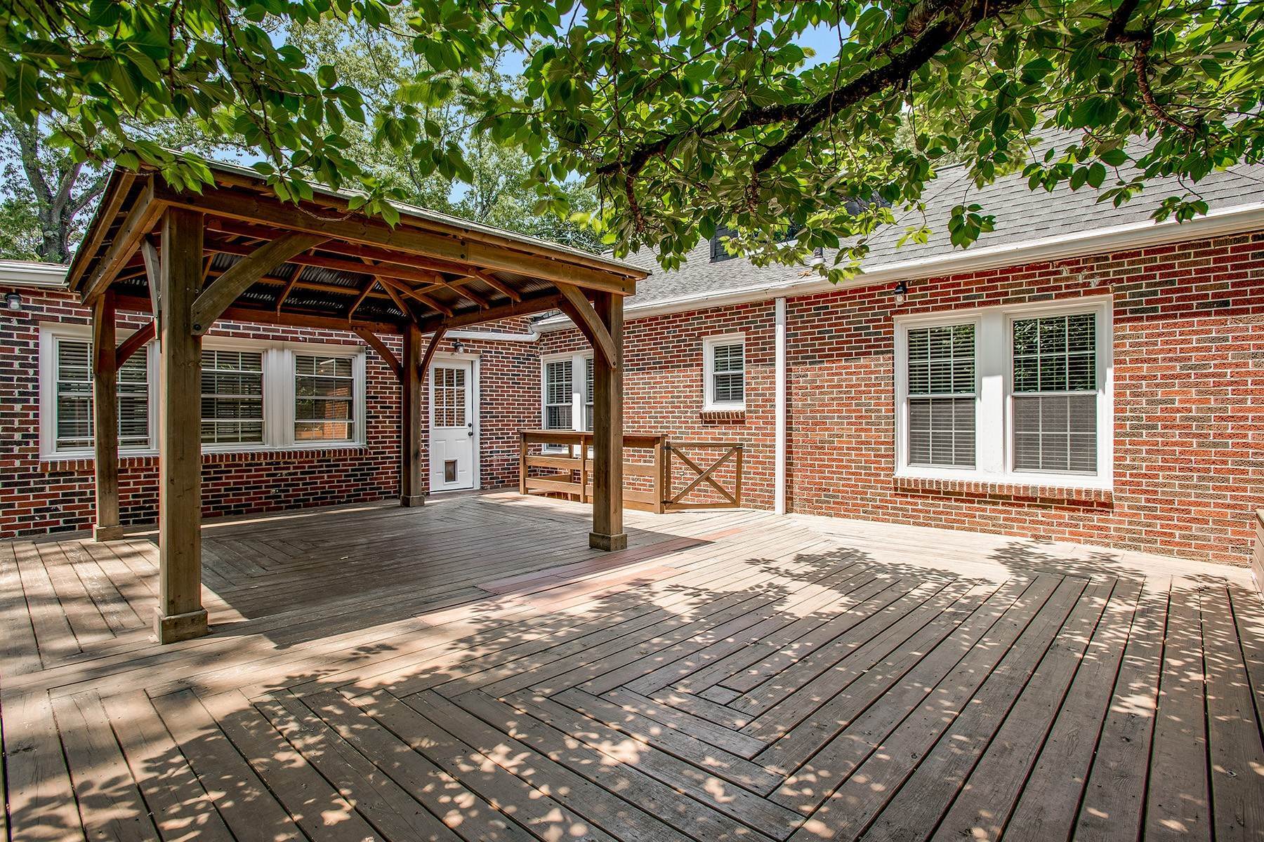 29. Single Family Homes for Sale at The Possibilities Are Endless In This Charming Four-Sided Brick Home 3551 Kingsboro Road Atlanta, Georgia 30319 United States